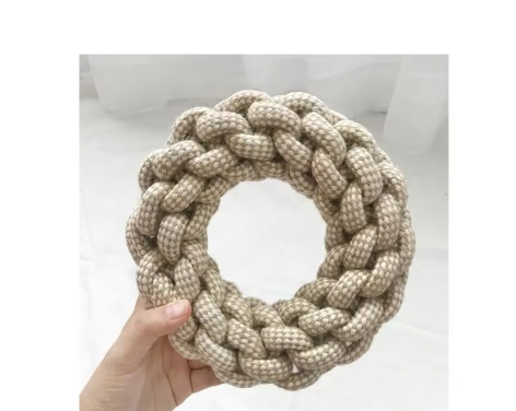 Closeup textured rope dog toy, soft yet firm, supports healthy dog teeth and gums.