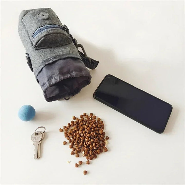 Dog training treat bag with easy-access magnetic closure and integrated poop bag holder, pet gear.
