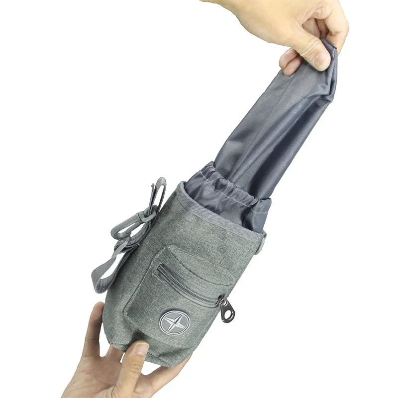 Durable unisex dog treat holder with separate compartments and an attached poop bag dispenser for walks.