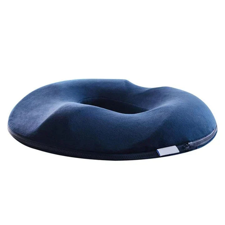 Unisex donut cushion for coccyx & hemorrhoid pain relief, providing ergonomic support for prolonged sitting.