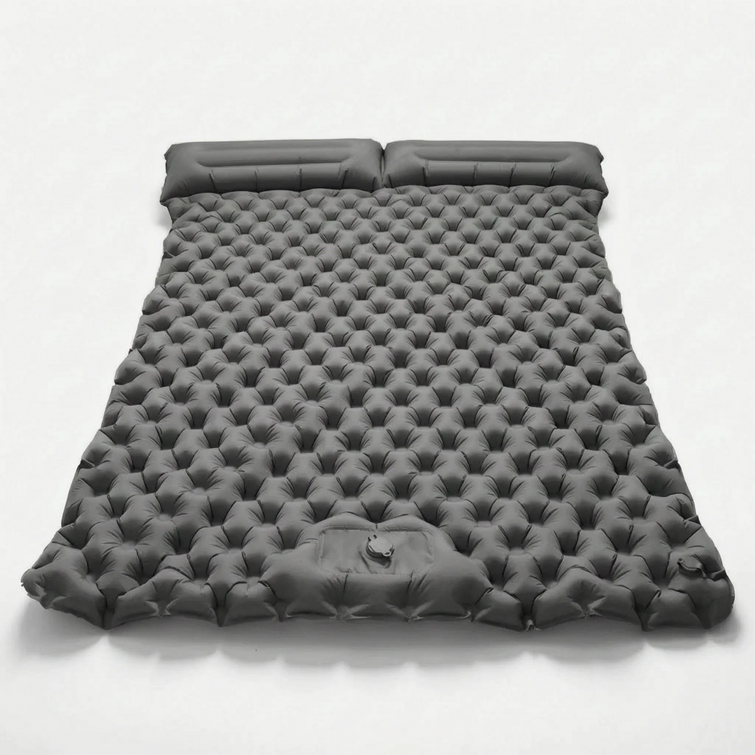 Portable double air mattress for camping, a versatile sleeping pad for any outdoor adventure.
