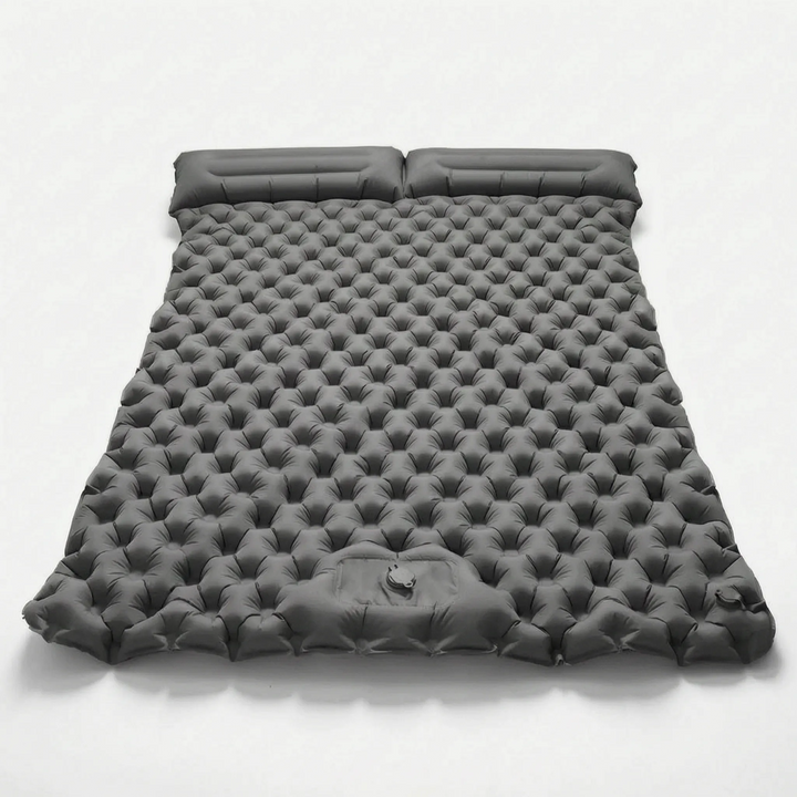 Portable double air mattress for camping, a versatile sleeping pad for any outdoor adventure.
