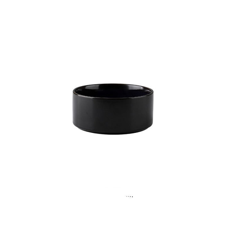 Elevated pet feeder with two ceramic bowls in wooden frame, ideal for cats and dogs, easy to clean.