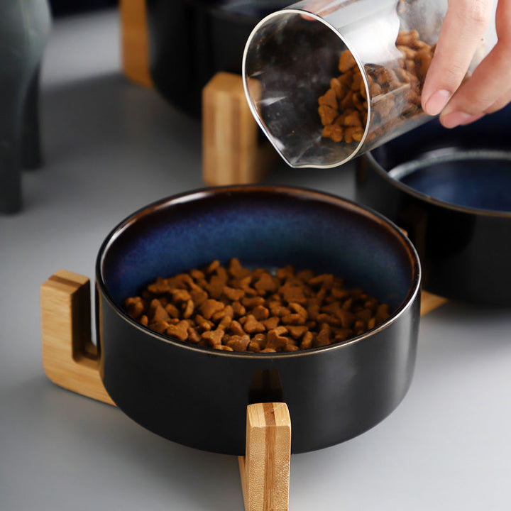 Stylish elevated dog bowl, double ceramic on wooden stand, promoting better posture for feeding.