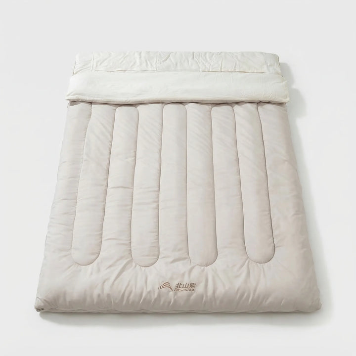 Durable unisex double detachable sleeping bag for outdoor camping, hiking & travel. Warm, comfortable & compact.