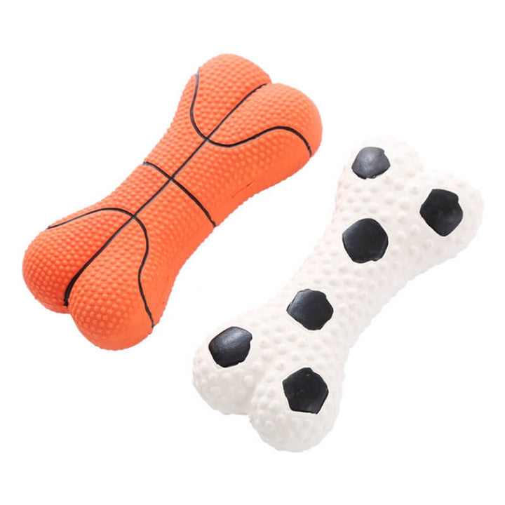 Detail shot of a sturdy squeaky bone dog toy, emphasizing its pet-safe latex material