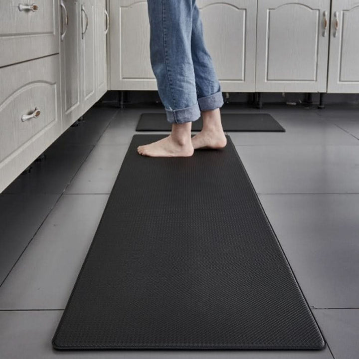 Ergonomic kitchen standing mat for anti-fatigue comfort during long hours in the kitchen; non-slip.