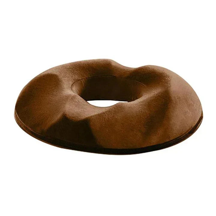 Memory foam donut cushion provides pressure relief, ergonomic support, & comfort for prolonged sitting.