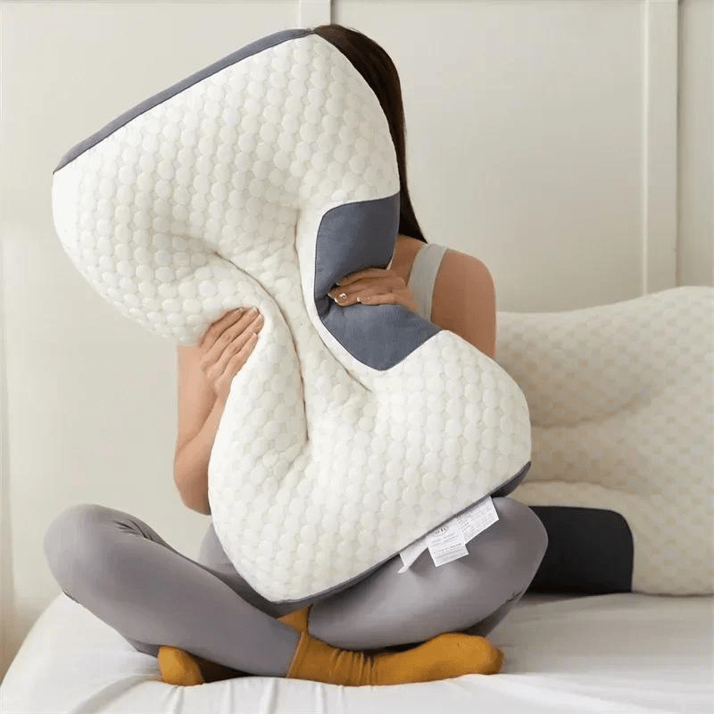 Ergonomic orthopedic pillow designed to alleviate neck & back pain, offering comfort & health benefits for sleep.