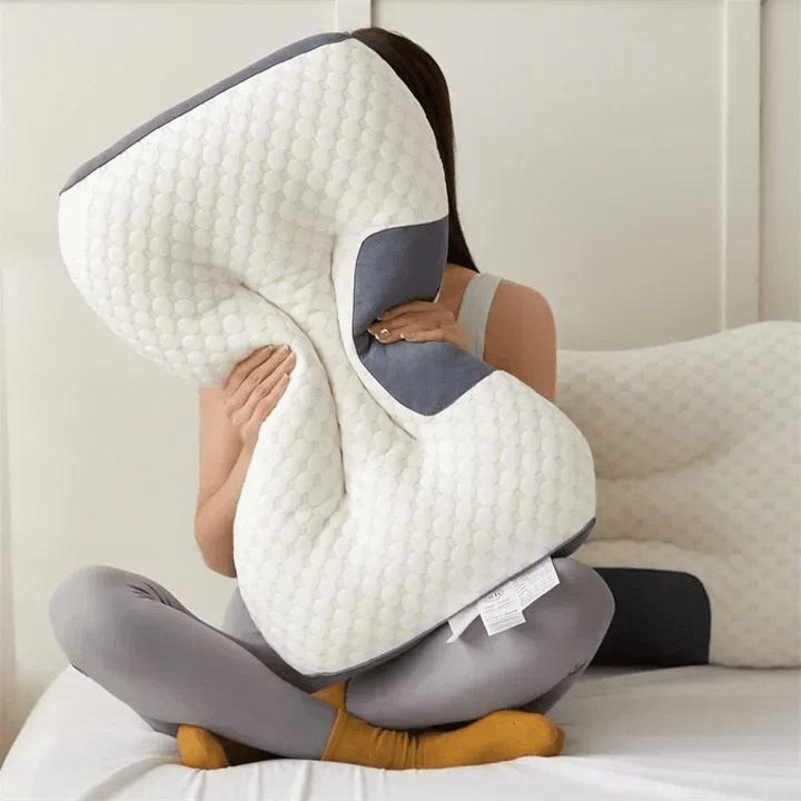 Ergonomic orthopedic pillow designed to alleviate neck & back pain, offering comfort & health benefits for sleep.