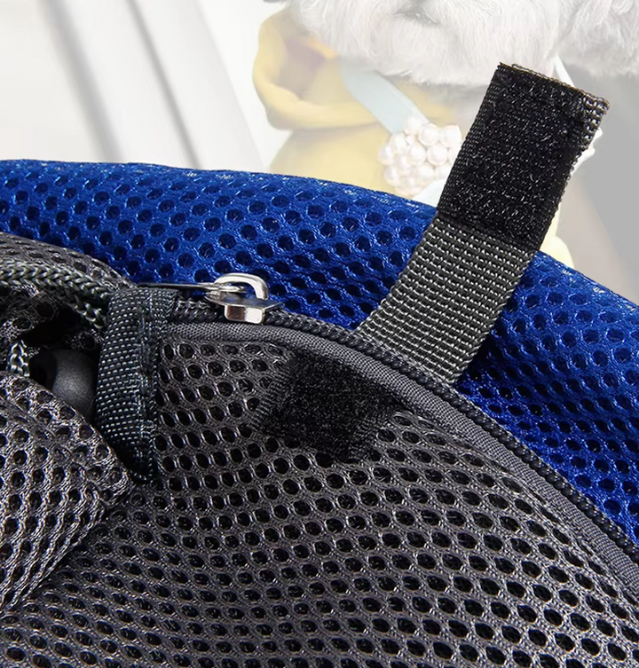 Unisex pet travel sling carrier shown with a small pet, emphasizing ergonomic comfort