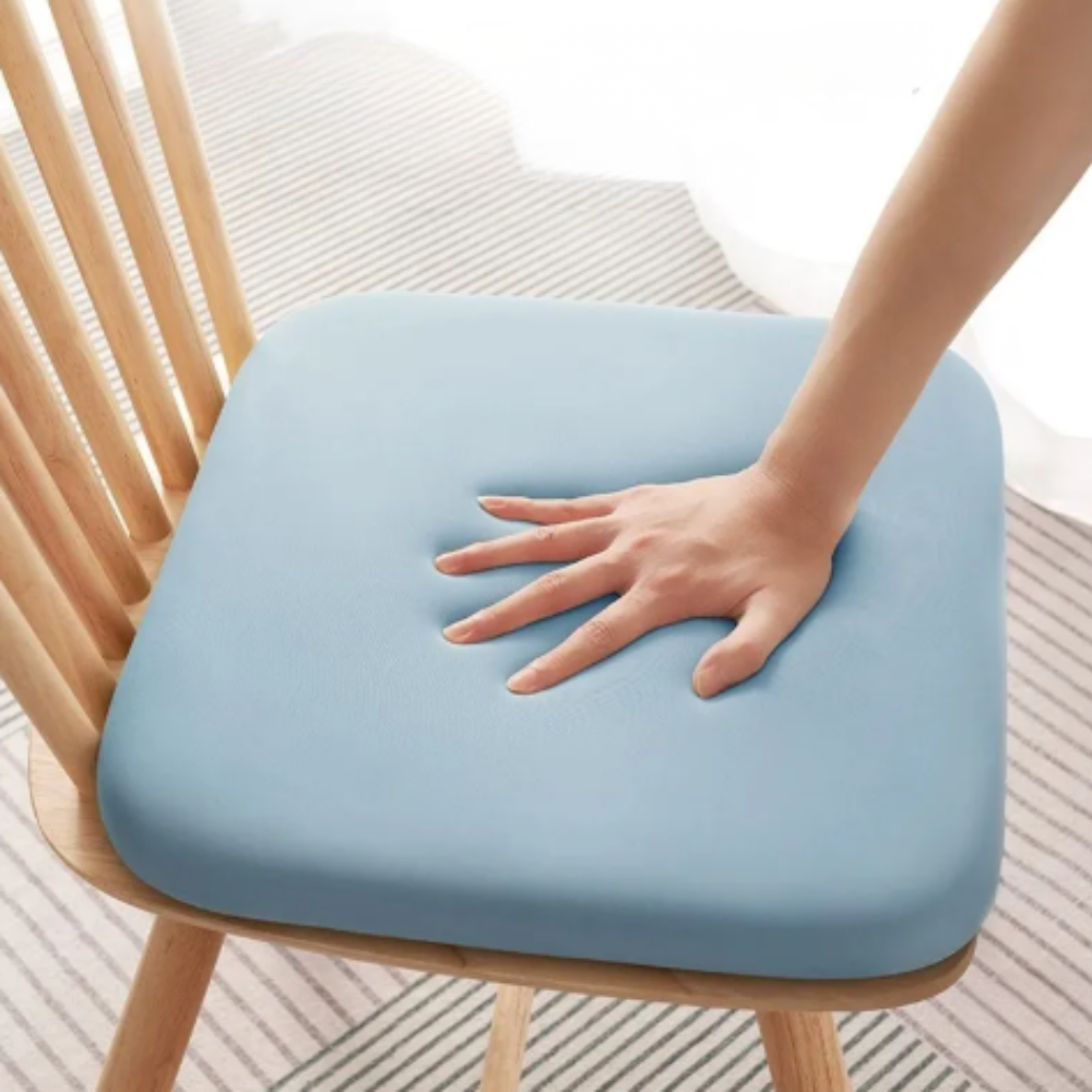 Travel essential ergonomic seat cushion for car, plane, or train, ensuring comfort & support.