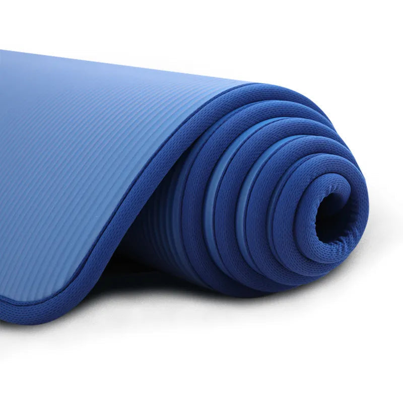 Blue non-slip yoga mat, extra thick for ultimate comfort & joint protection during home gym workouts & pilates.