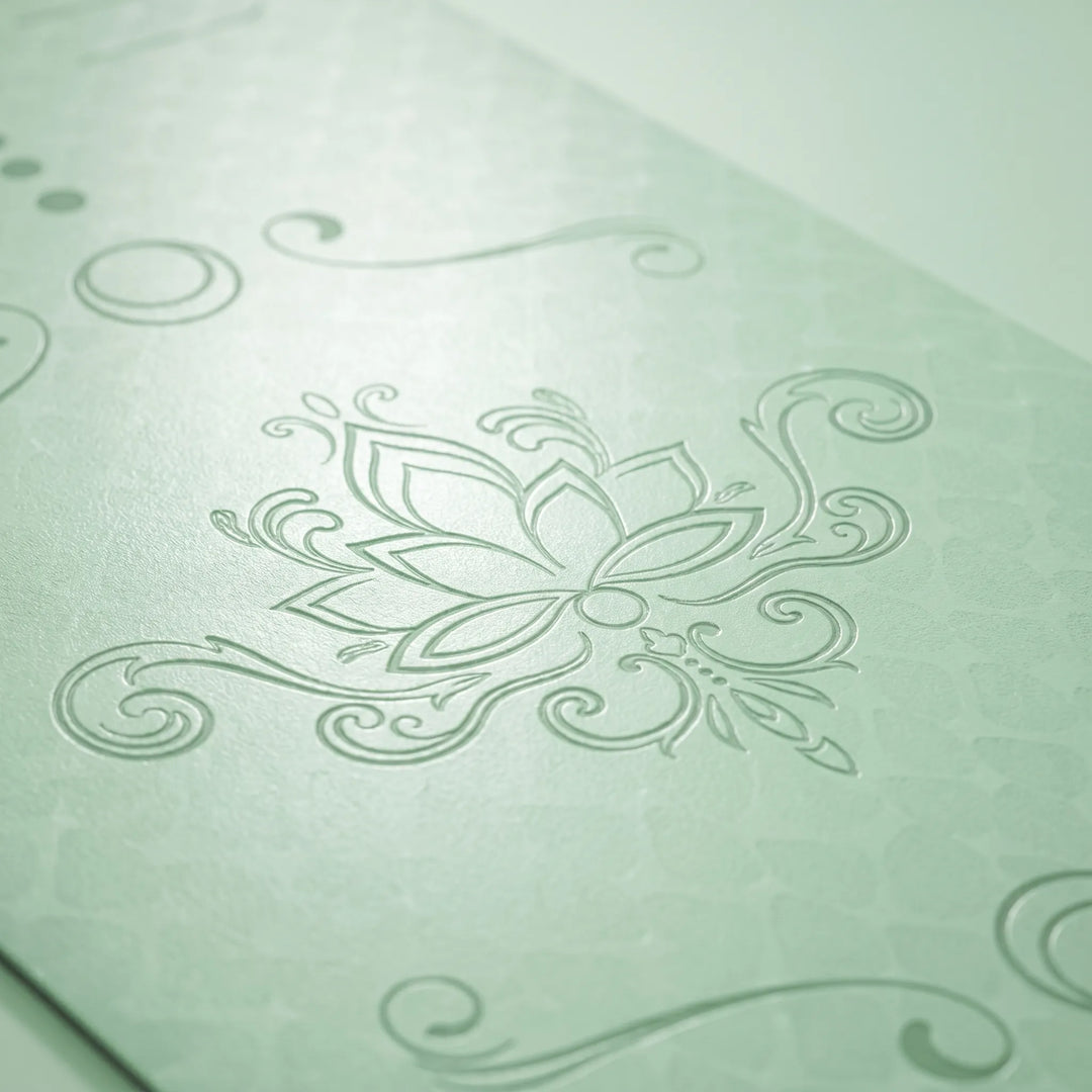 Thick TPE exercise mat, non-slip & cushioned for comfortable home workouts, yoga & pilates.