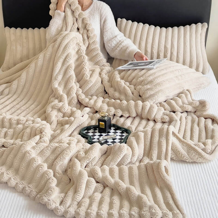 Unisex faux rabbit fur plush sofa throw blanket in a cozy living room setting, soft & warm decor.