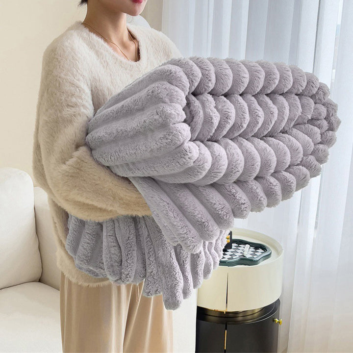 Comfortable and warm unisex faux rabbit fur blanket, essential for chilly fall and winter evenings.
