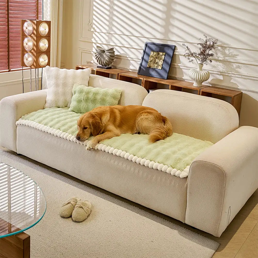 Corner view of a non-slip faux fur couch cover, thick plush for maximum furniture protection