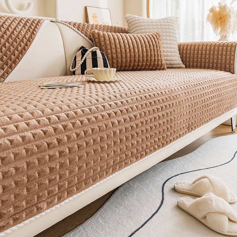 Soft flannel pet couch protector with non-slip backing, perfect for pet-friendly homes.
