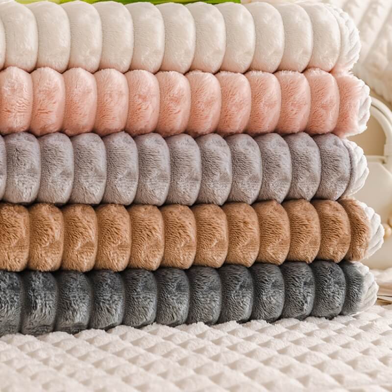 Pet-friendly flannel couch protector, designed for comfortable and slip-resistant use.