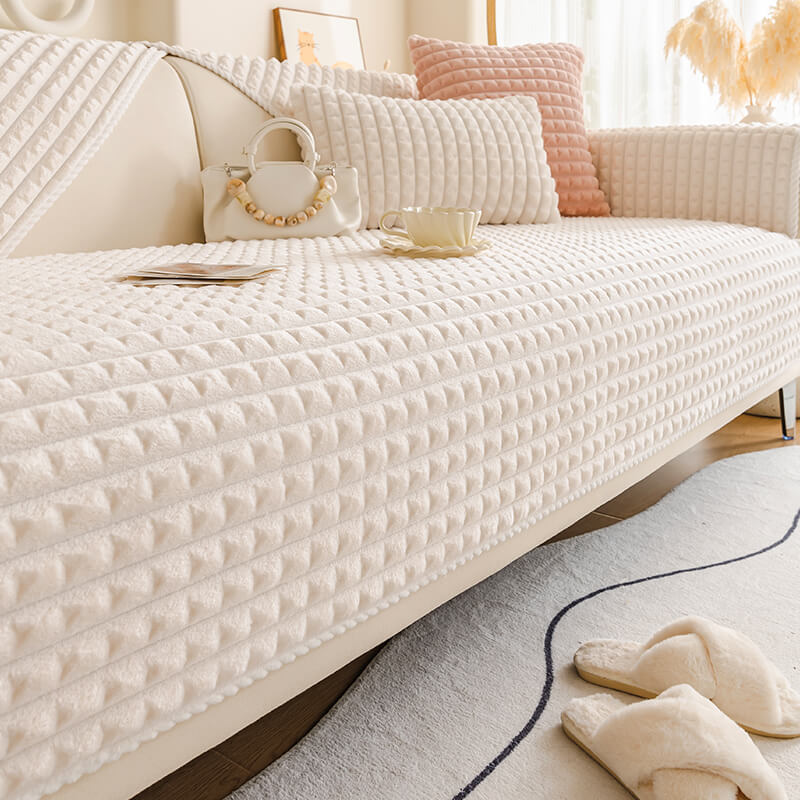 Detail of the non-slip backing of a flannel pet-friendly couch cover.