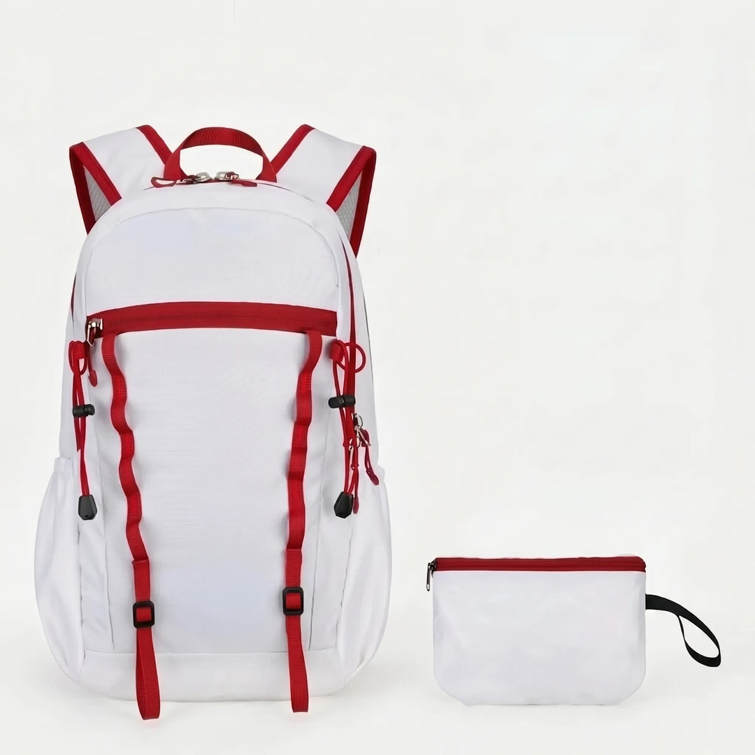 Zippered pockets & adjustable straps on a unisex cyan foldable hiking daypack. Compact & functional travel pack.