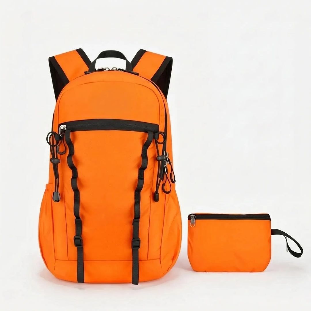 Versatile unisex cyan foldable daypack, perfect as a lightweight travel pack or compact hiking backpack for adventure.