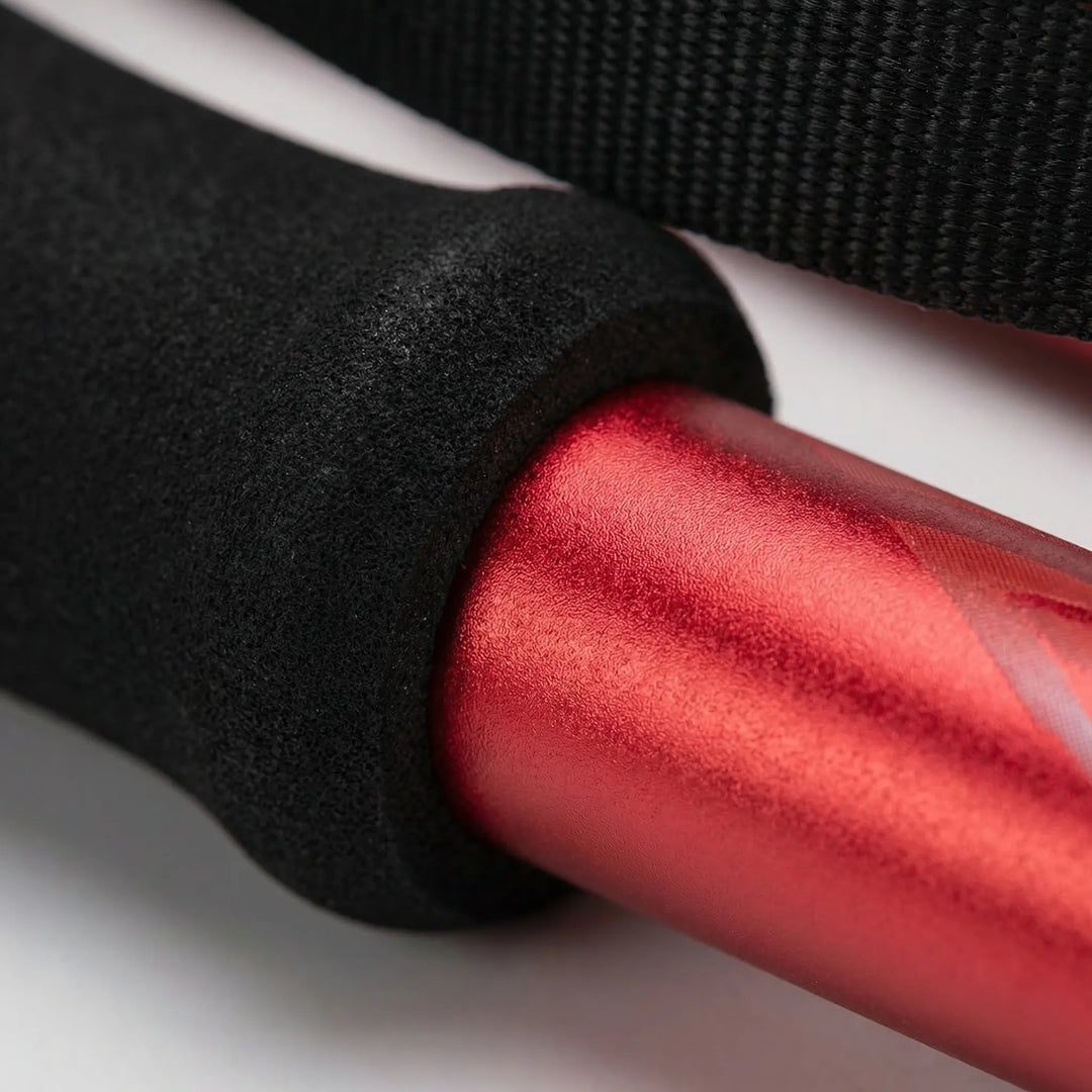 Fully extended telescopic hiking poles with visible height adjustment, perfect for diverse trails.