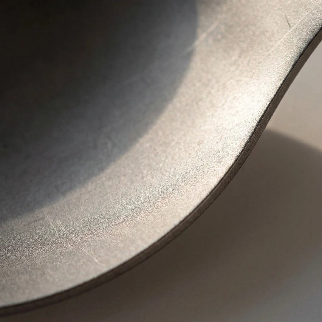 Durable titanium spork, a must-have for camping, hiking, & picnics. Foldable & lightweight outdoor utensil.