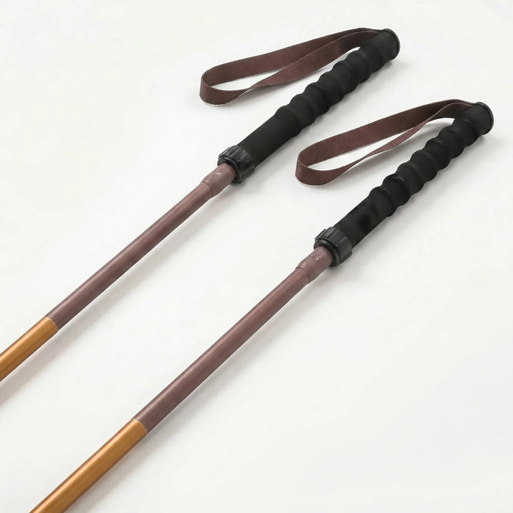 Compact folded quick lock trekking pole, perfect for easy transport in backpacks during hikes or travel.