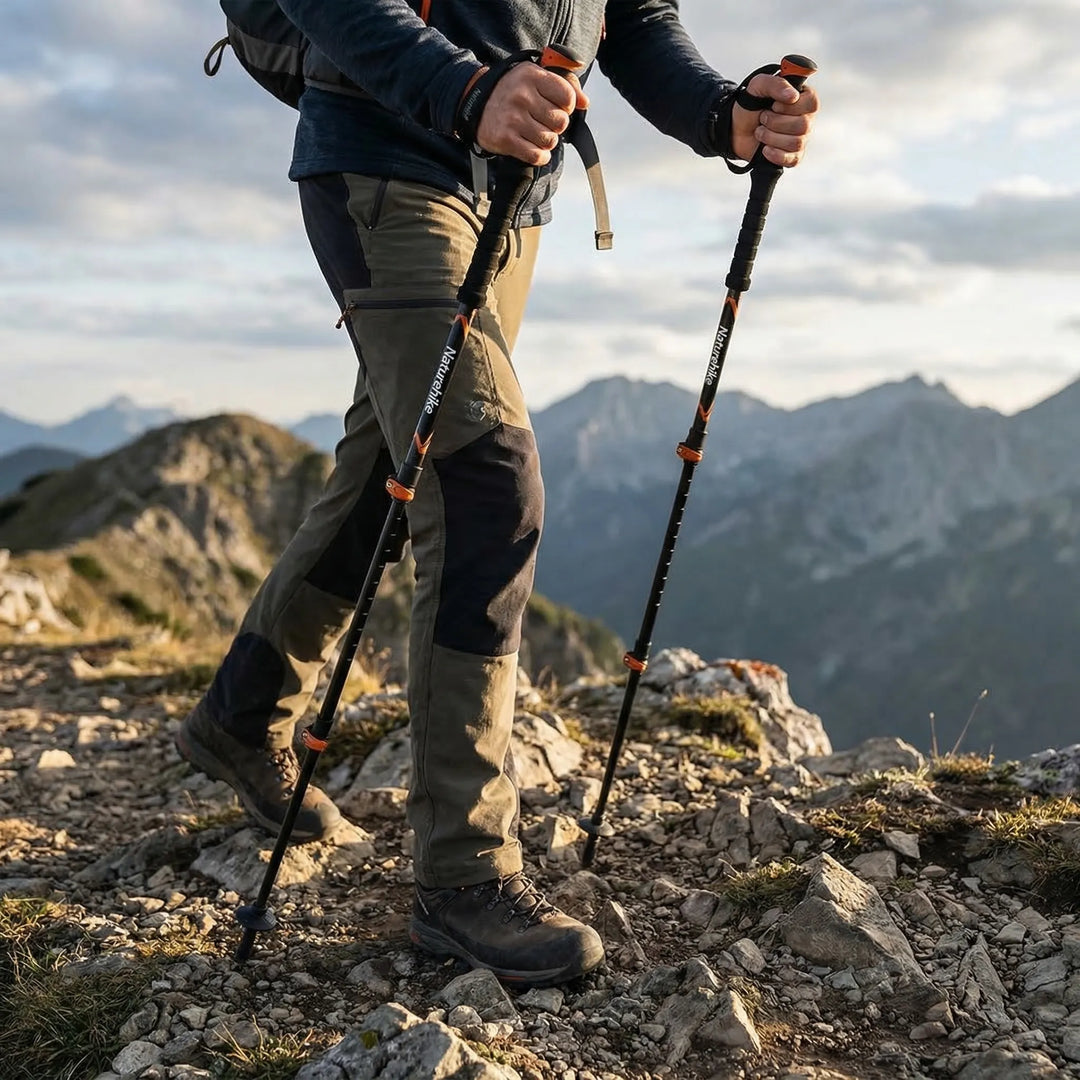 Unisex folding trekking pole, compact & lightweight for hiking and trail adventures.