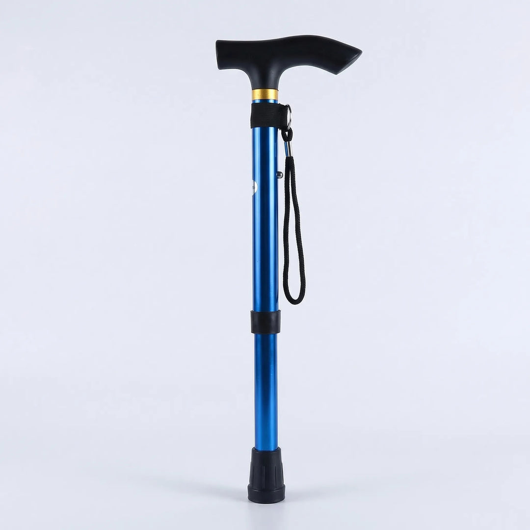 Ergonomic handle of a black folding walking cane, designed for comfortable, secure grip & improved stability.