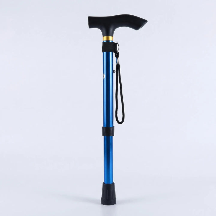 Ergonomic handle of a black folding walking cane, designed for comfortable, secure grip & improved stability.