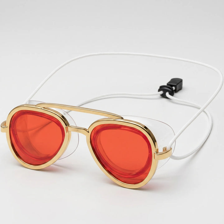 Bright red unisex aviator swim goggles. Full wide-view anti-fog lenses provide clear vision for swimming and water activities.