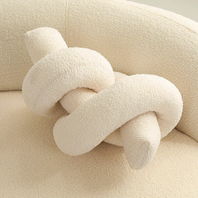 Stylish geometric twist pillow for couch covers, adding a decorative touch to any living space