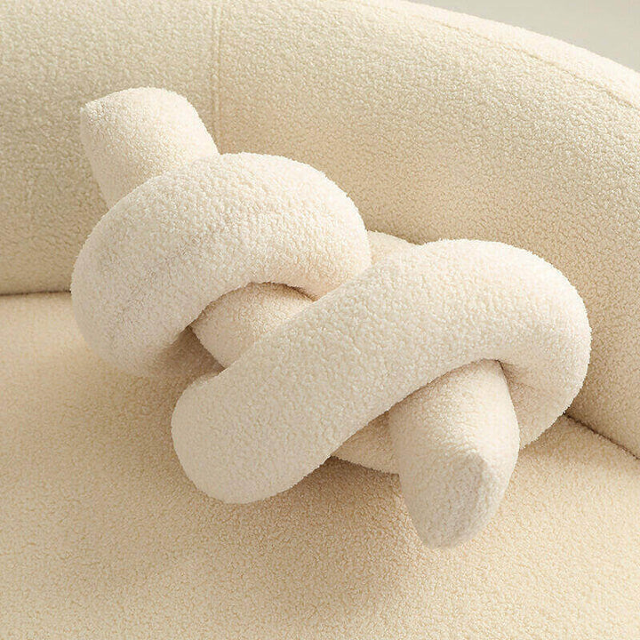 Stylish geometric twist pillow for couch covers, adding a decorative touch to any living space