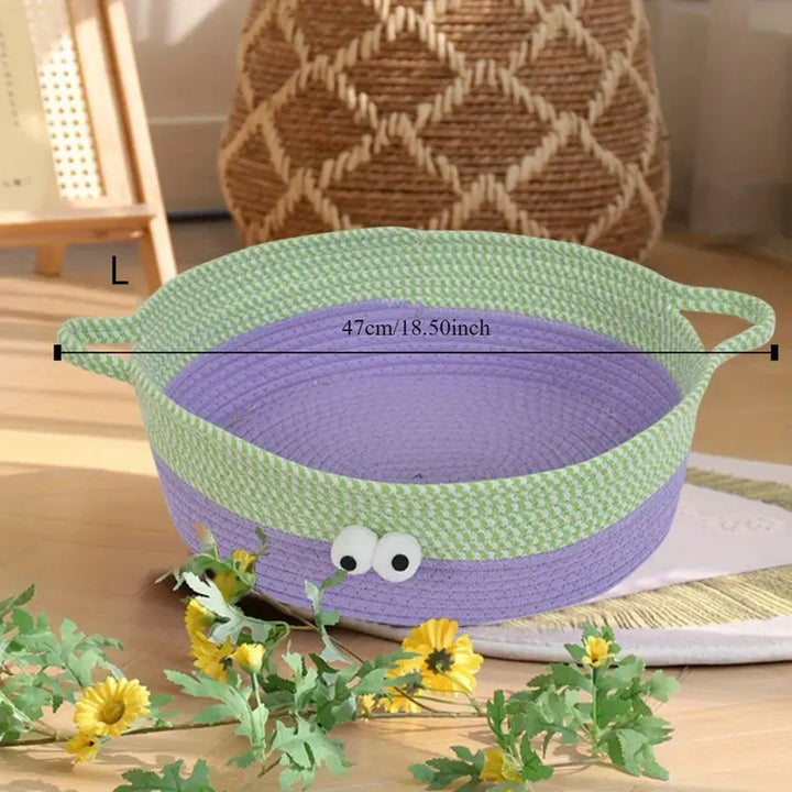 Hand-woven cotton cat bed with animal design, providing a cozy and stylish retreat for pets