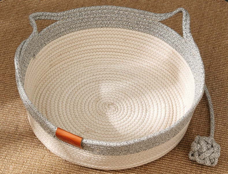 Cat lounging comfortably in a unisex cotton rope pet bed with scratcher
