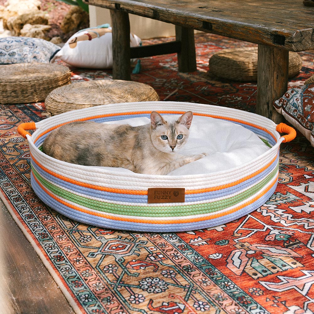 Neutral-toned striped pet bed, handcrafted to blend with any interior
