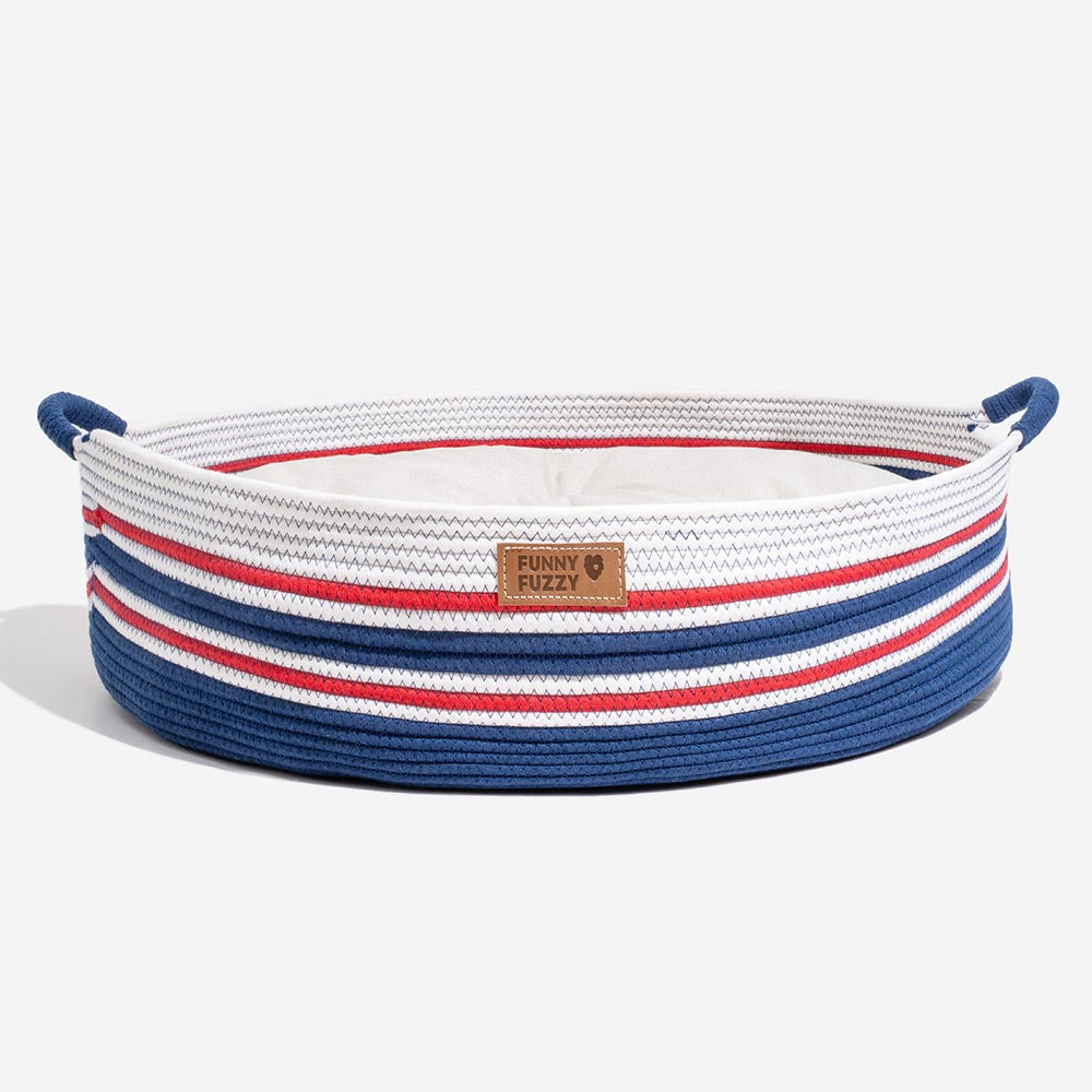 Handcrafted striped dog bed, providing a soft and calming retreat