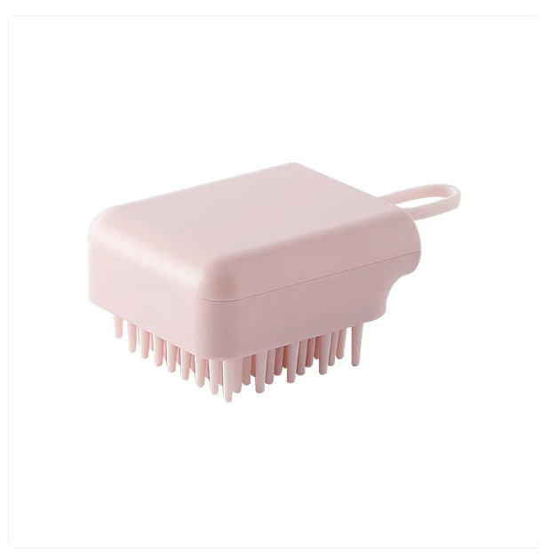 Close-up of circular handheld massage brush, ideal for body exfoliation and improved circulation