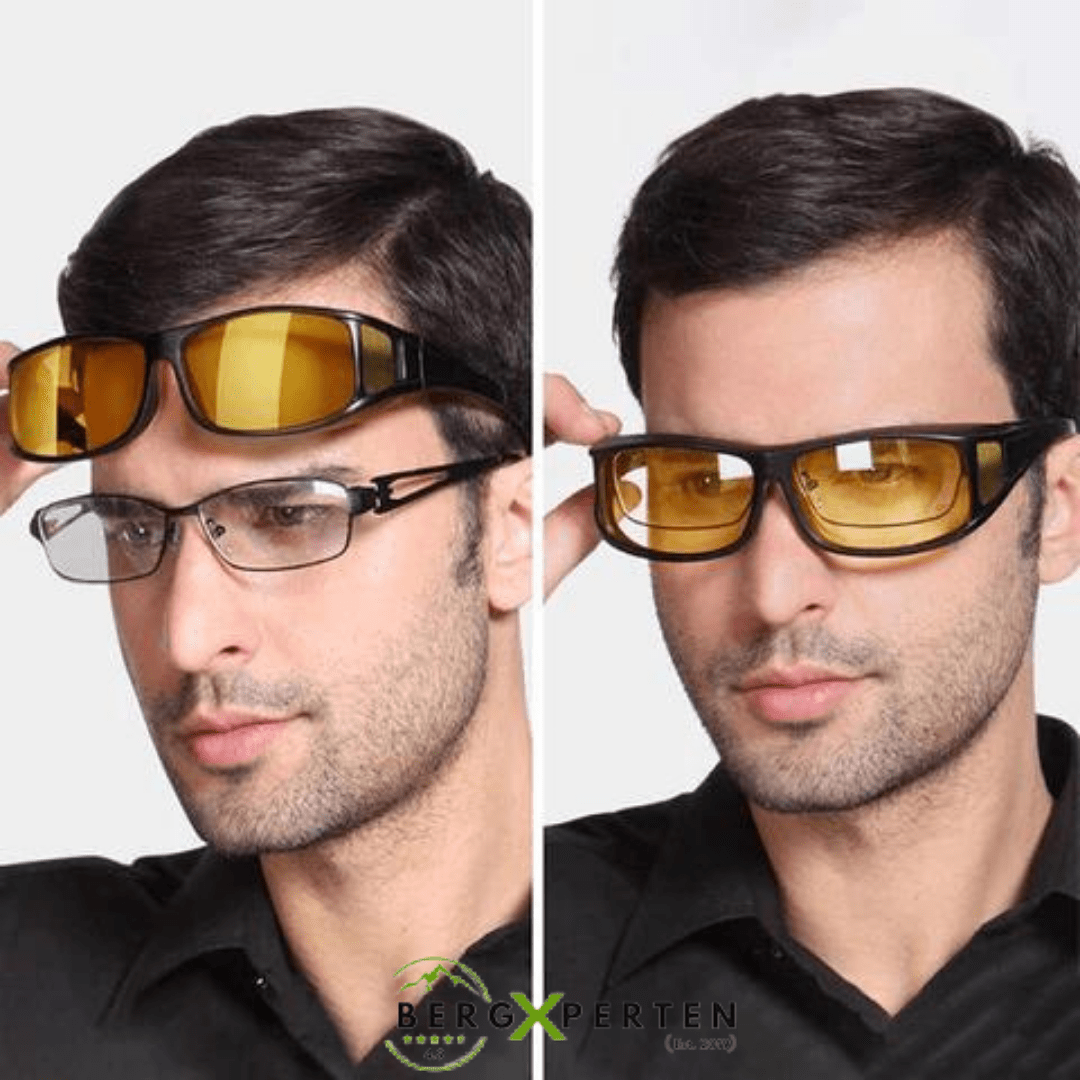 Pair of unisex night vision glasses, offering glare protection & improved clarity for safe night driving.