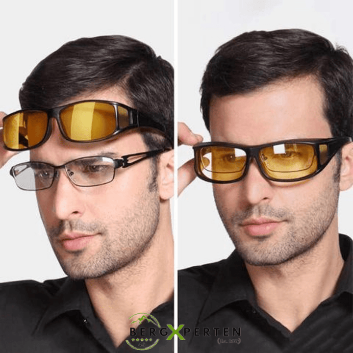 Pair of unisex night vision glasses, offering glare protection & improved clarity for safe night driving.