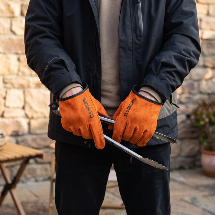 Unisex heat-resistant gloves for outdoor grilling, BBQ, and campfire cooking. Durable fire protection work gloves.