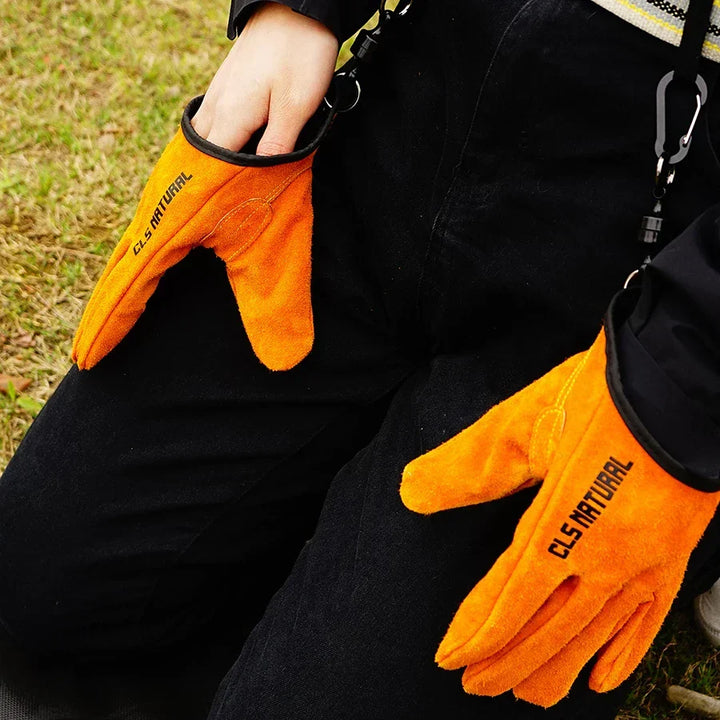 Unisex heat-resistant gloves ready for grilling, BBQ, and campfire tasks. Essential protective gear for outdoor cooking.