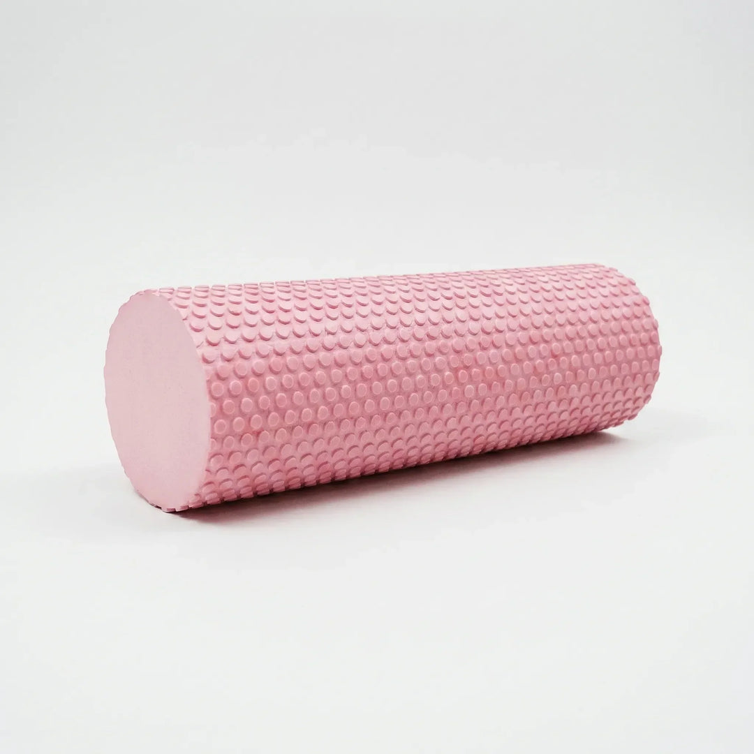 Compact high-density foam roller for yoga, Pilates, and stretching. Aids muscle recovery and flexibility.