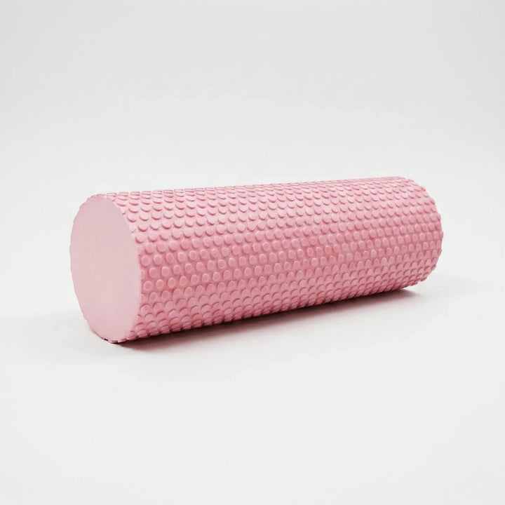 Compact high-density foam roller for yoga, Pilates, and stretching. Aids muscle recovery and flexibility.
