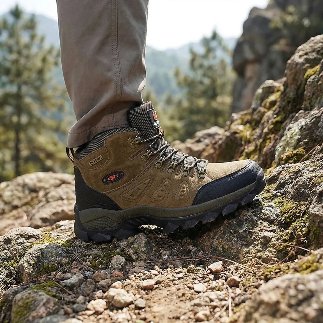 Unisex high-top hiking boots, durable for trail adventures with rugged all-terrain traction.