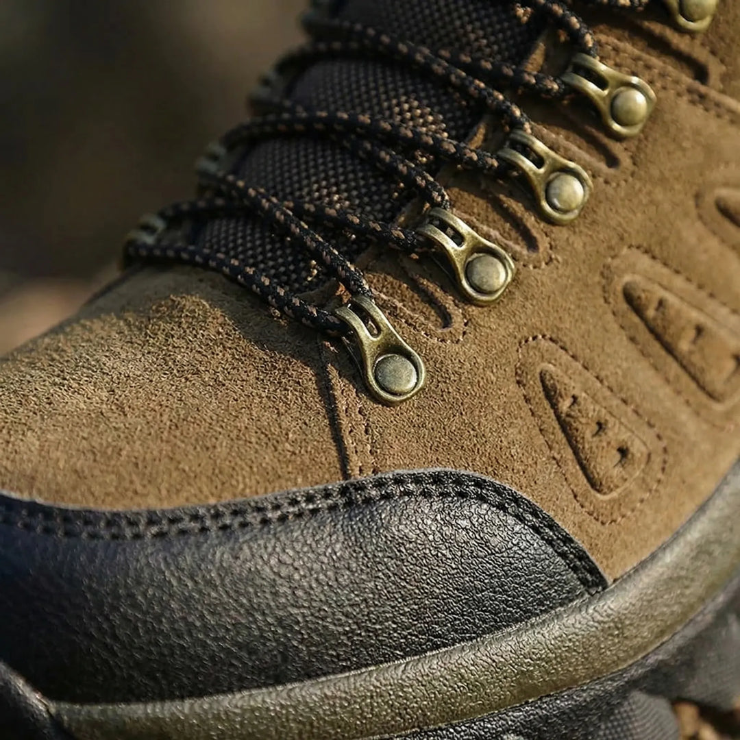 Durable high-top unisex hiking boots for all-terrain walking & challenging trail adventures.