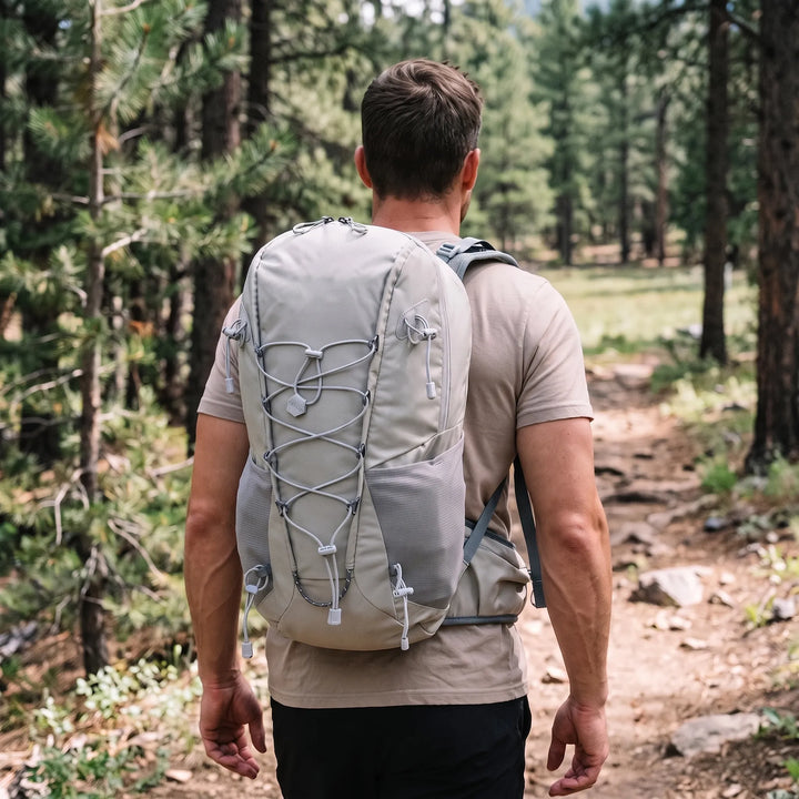 Unisex hiking daypack backpack for outdoor adventures. Lightweight and comfortable for trail trekking.