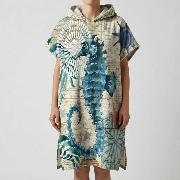 Absorbent hooded changing poncho, ideal for discreet changing and quick warmth after swimming.